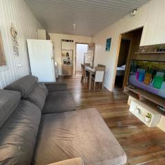 Casa pé na areia em capão da canoa