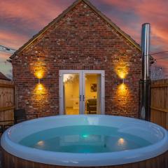Luxury barn with private wood fired hot tub