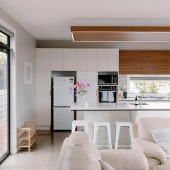 Sunny and Modern Nelson Retreat with Designer Kitchen