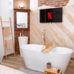 Marcos Apartments I Bathtub in Bedroom experience