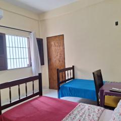 Suíte perto do Centro e de Praias