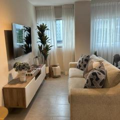 REFA - 404 · Luxury 1BR Suite in Piantini | Modern • Pool • Gym