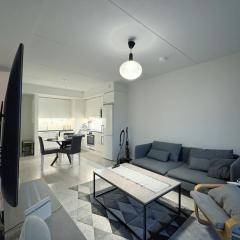 New one bedroom with terrace close to airport