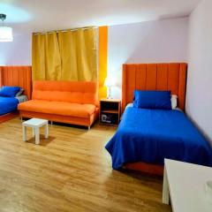 Suite Naranja moderna para 3 huéspedes Cocina equipada, Wi-Fi rápido y excelente ubicación céntrica