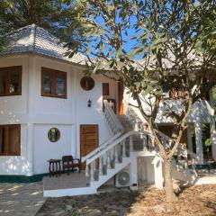 Hotspring Hexagon House