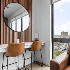 Luxury Downtown High-Rise Condo with Pool, Gym, Parking