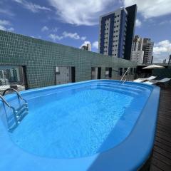 Apê em Tambaú com piscina, garagem e 2 quartos