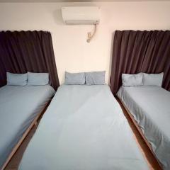 Wide bright room with three beds!