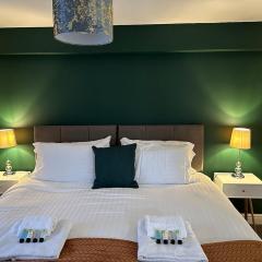 Orange Lilly in Stroud with Free Parking