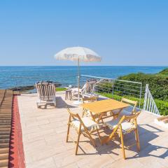 Villa fronte mare a Fontane Bianche con accesso diretto al mare