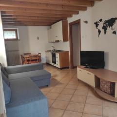 Grazioso appartamento con giardino e posto auto