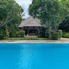 Beachfront Villa Mawar with Private Pool and Sunset View