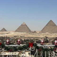 rizkyan pyramids view INN