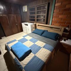 Casa Canasvieiras 2 Dormitórios a 3km do mar Sala, cozinha, 2 dormitórios, banheiro, área com churrasqueira e amplo espaço externo