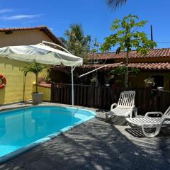 Casa com piscina e churrasqueira para familia