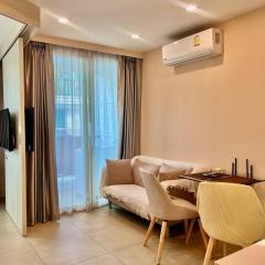 City Garden Olympus condo with balcony washing machine pool view