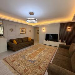 Renovated 2BR Garden Flat 300 m to Sarımsaklı Beach