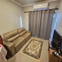 Apartamento NOVO Completo - Ar, Wi-Fi, Garagem e Churrasqueira