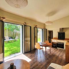 Maison plain-pied avec jardin