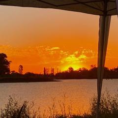 Eco house in a gated neighborhood with a lagoon and dock