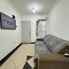 Apto Canto do Forte a Passos da Praia com Wifi