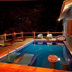 Beautiful West Bay Beach with pool steps to Beach