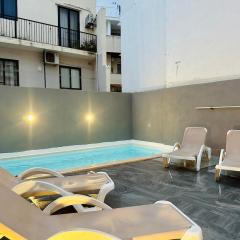 Central Oasis with Private Pool and Lounge Area