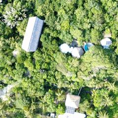 New Ruins Off-The-Grid SuperAdobe Domes with Pool