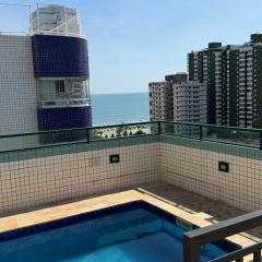 Aconchego no Canto do Forte - Ar Condicionados - Tvs Grandes - Wi-fi e Estacionamento Incluso!