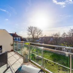 Wohlfühl-Ferienwohnung in Strandnähe mit großem Sonnenbalkon und Blick ins Grüne
