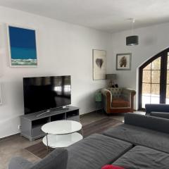 Modern mountain home with a view of nature