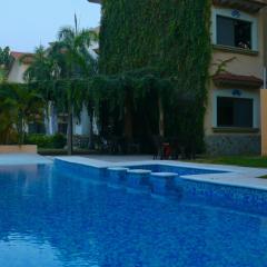 Penthouse en Huatulco con alberca, balcón, 5 min playa