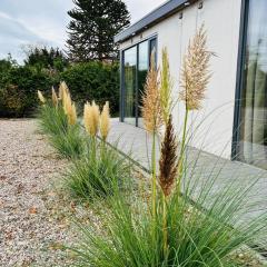 Loft-Charme trifft Natur - helles Modulhaus am NOK