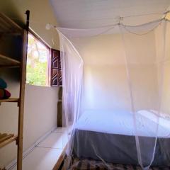 Quarto acolhedor para mulheres no Vale do Capão