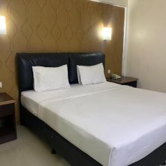 Grand Populer Hotel Deluxe Twin by Millpro