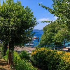 Faszinierendes Apartment nur 50 Meter zum Strand mit Meerblick, Waschmaschine, Klima, WiFi