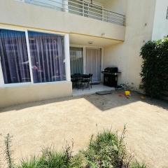 Apartment with a private backyard