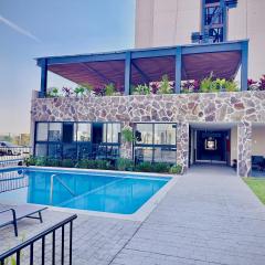 Departamento moderno con alberca, terraza y acceso controlado