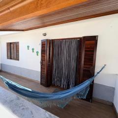 Casa de Praia Martim de Sá-700 metros - Com 05 camas -sendo uma de casal -02 vagas de Garagem e entrada individual- Roupa de cama -Ventiladores