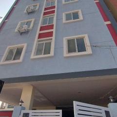 Hotel O KSR Guest Rooms