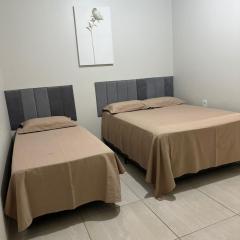 Quarto com ar banheiro frigobar