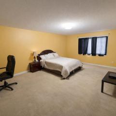 Spacious & Private Master Bedroom with Ensuite Bathroom in Brampton! Shared Full Kitchen, Living Room, and Patio!