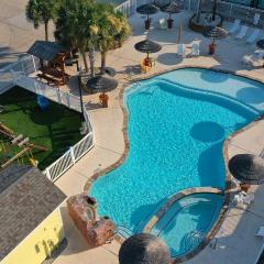 Sleeps 18 2 Beach Homes w 2 Pools Playground Covered Patios Pirates Bay by AvantStay