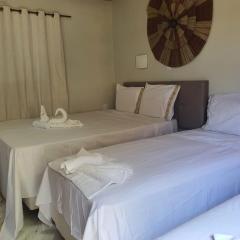 Bangalô em uma área próxima a praia e centro