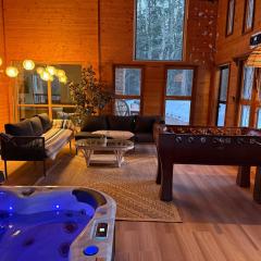 Bragg Creek Vacation Estate with hot tub, sauna, pool table, karaoke, private pond and forest trails