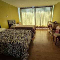 Dormitorio con baño privado a 25 minutos del Apto