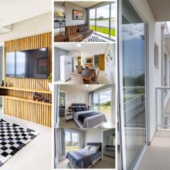 Sobrado 3 com 2 suítes, sacada e vista para o mar