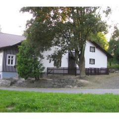 Holiday home in a quiet, authentic mountain village with a view of the surrounding hills