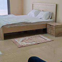 King-size bed ocean view room