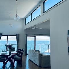 Peaceful Waterfront Retreat with Private Jetty Near Train